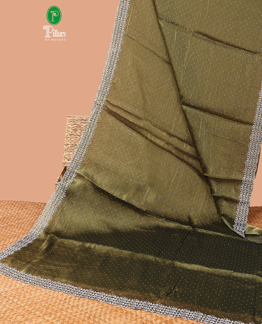 Green all-over stone work burburry chiffion saree with self cutthana stone work border