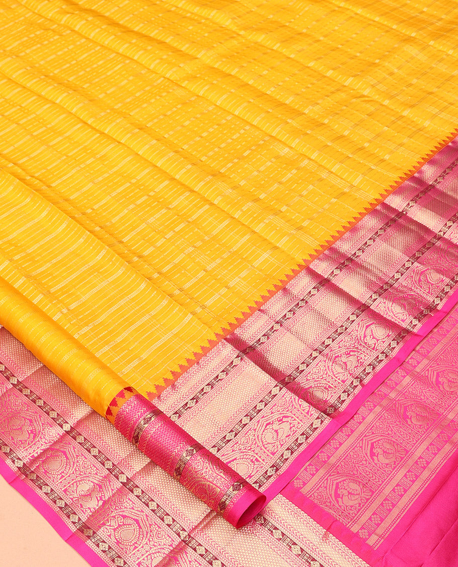 Yellow Vasundhara Silk Saree, Sparsely Threaded with Zari Checks, a Contrast Border of Kathir, Kuyil Kann, Manga, and Mayil Designs, Floral Design Pallu, and a Contrast Blouse