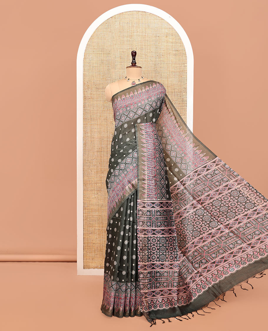 Black Tussar Silk Saree, Adorned with Buttas, Artfully Designed Ajrakh Printed Border, a Pallu of Ajrakh Print, and a Contrast Blouse
