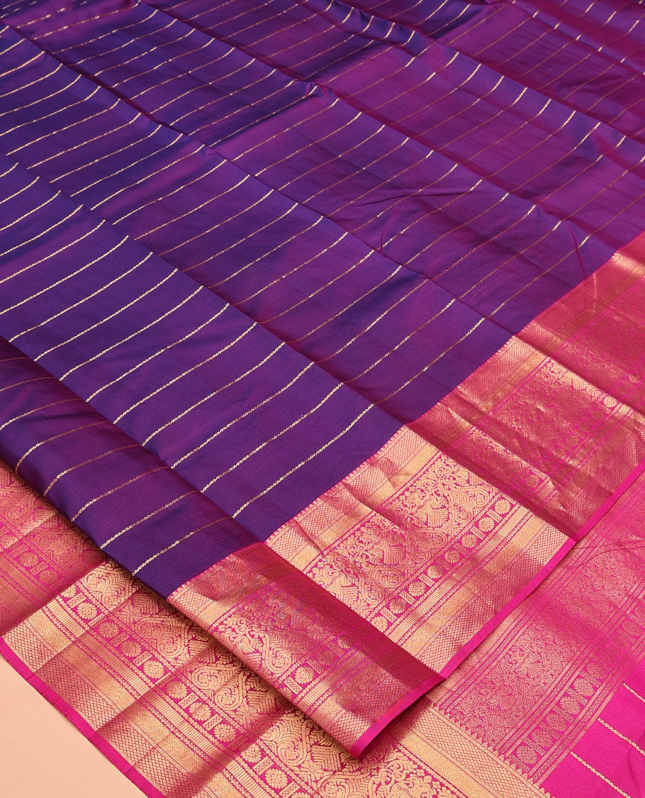 Purple Vasundhara Silk Saree, Enriched with Neli Stripes On Its Body, Complemented by Captivating Contrast Border of Mayil Kann, Vanki, Iru Thalaipakshi, Chakram, and Neli Designs, Grand Pallu, and Paired with a Contrast Blouse