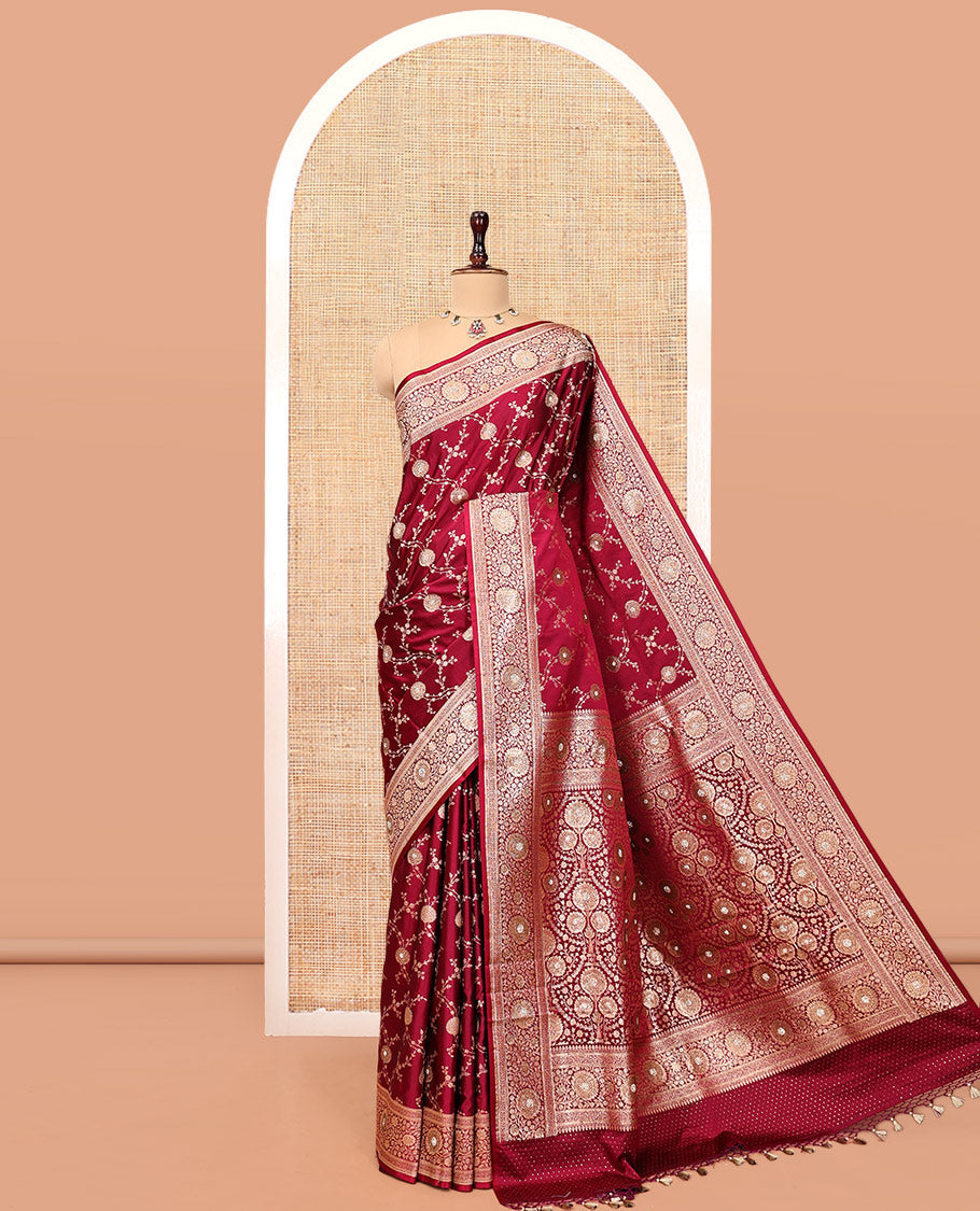 Red Wine Banarasi Satin Saree, Gleamed Up with Floral Jaal Jacquard, a Floral Creeper Border, Intricate Stonework Pallu, and a Matching Blouse