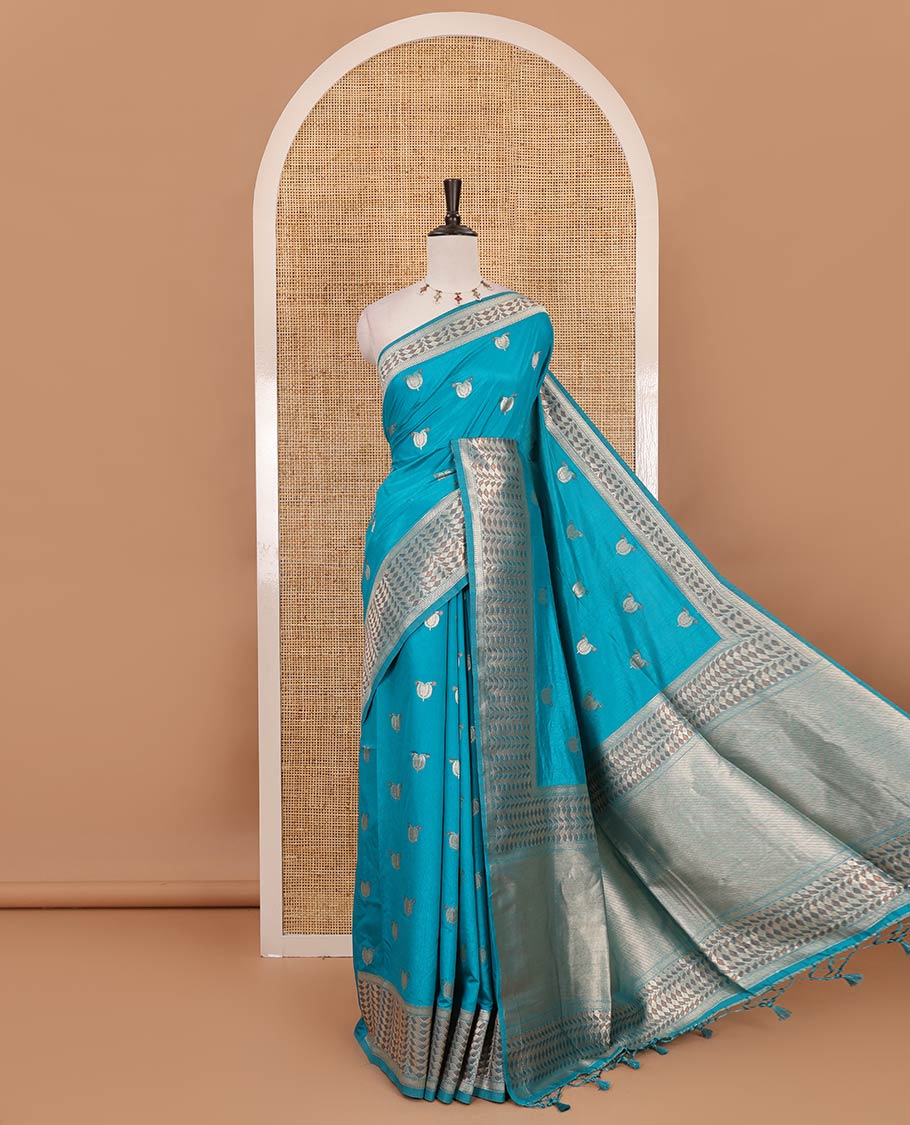 Blue leaf zari buttas dola silk saree, geometric patterned zari border, pallu of geometric pattern & diagonal stripes & plain blouse