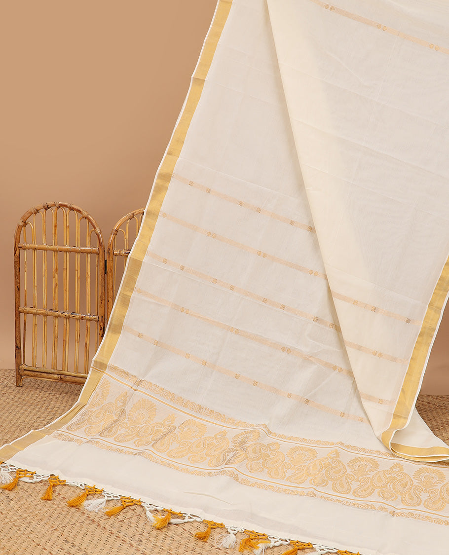 Cream kerala saree with zari designs, zari border & pallu of paisley designs in zari