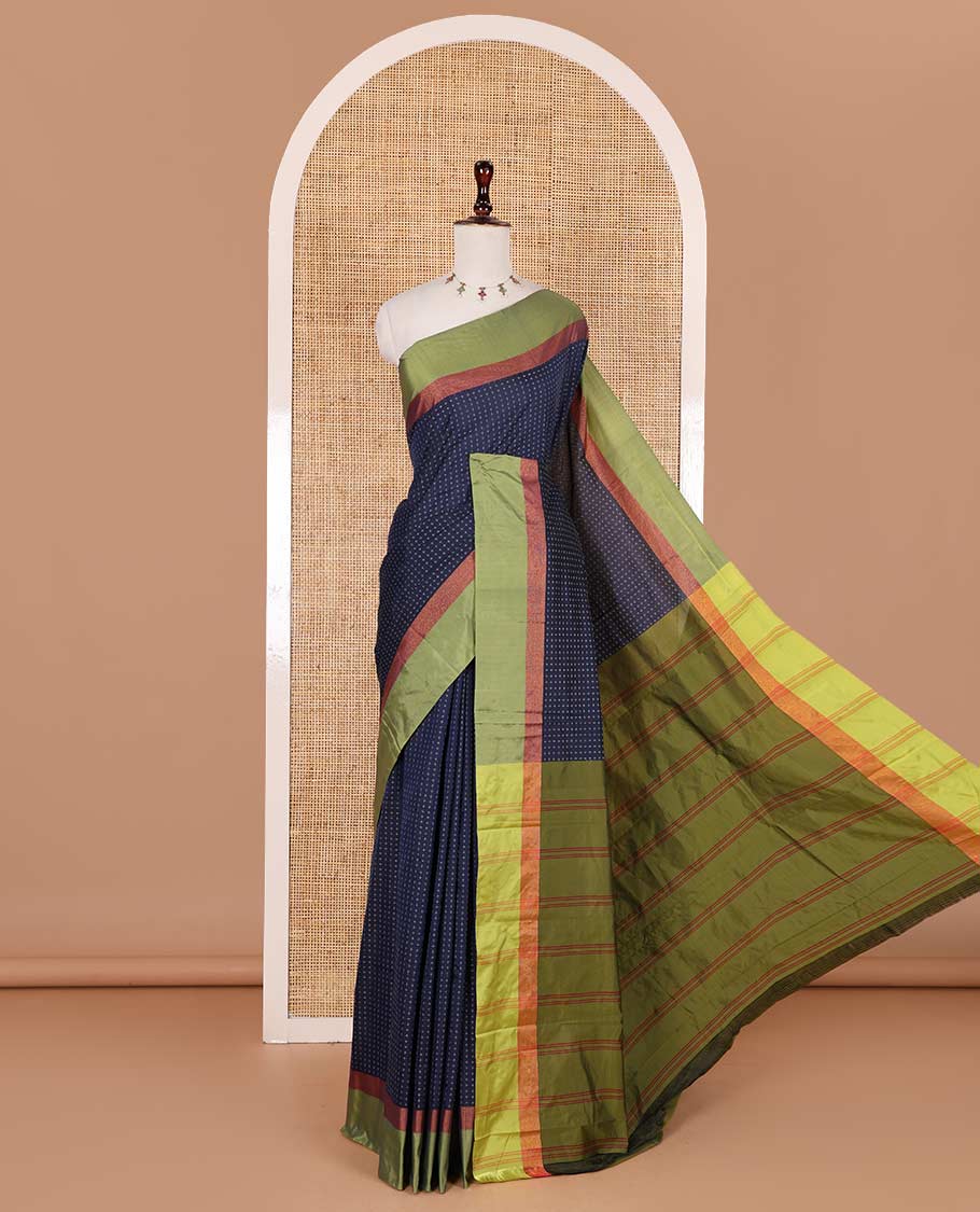 Navy blue-green plus-shaped buttas steeped semi-soft silk saree, contrast satin border of stripes, striped pallu, and contrast blouse