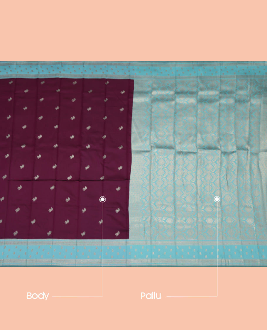 Wine Litchi Saree, Bedecked with Zari Buttas, a Contrast Traditional Zari Border, Grand Pallu, and a Contrast Blouse
