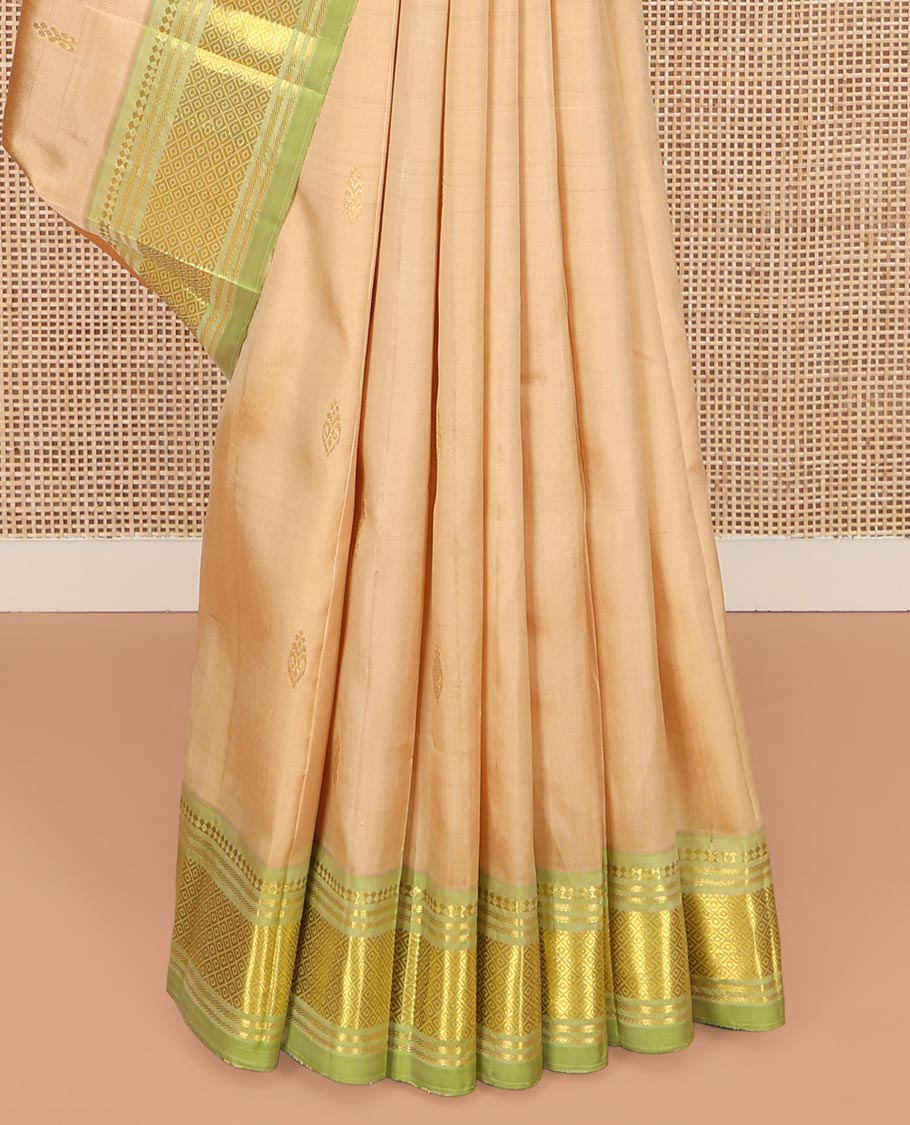 Sandal Kanchipuram Silk Saree, Subtly Sparkled with Thread Buttas on Its Body, Complemented by a Contrast One-Sided Border of Panner Sombu, Banaras, and Mayil Kann Designs, Pallu Features Zari Designs, and Comes Without a Blouse