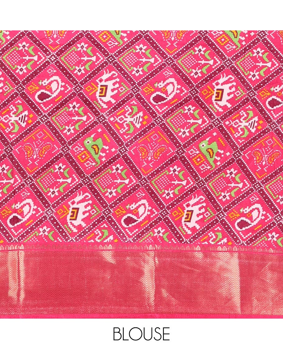 Maroon plain dola-tussar saree, contrast temple zari border, patola animal motifs enclosed jaal printed pallu & patola printed blouse