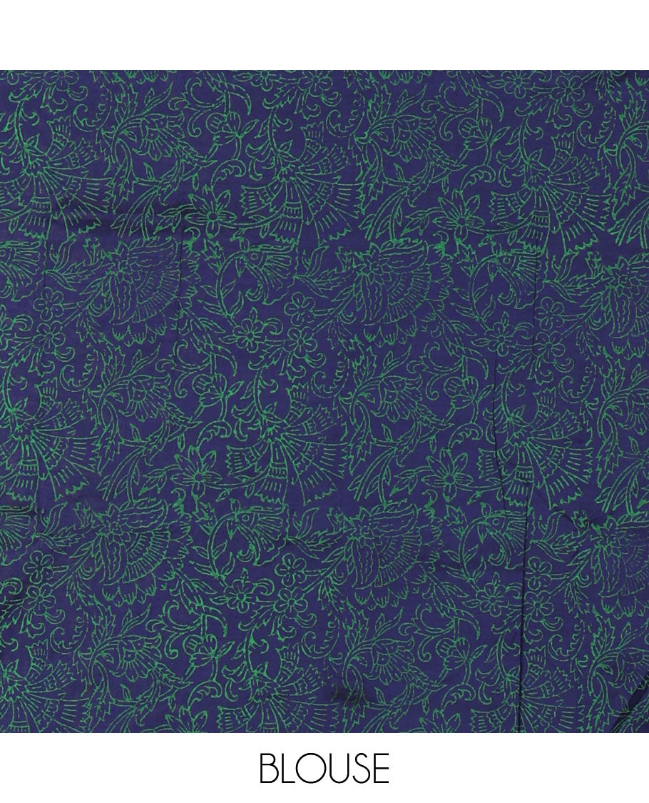 Borderless orange kolam and kathakali motifs printed South cotton saree with a matching blouse, and a contrast floral vine printed blouse