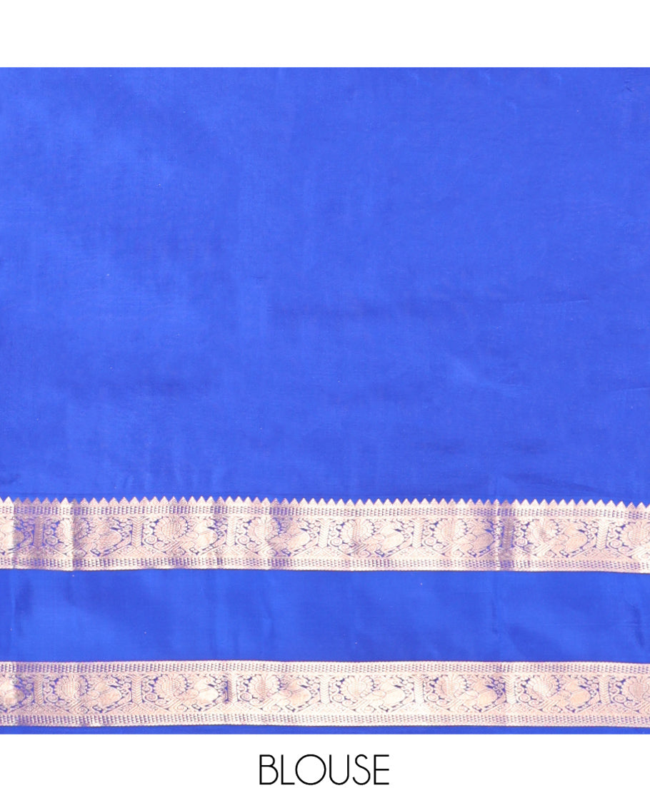 Pastel Sea Green Vasundhara Silk Saree, Ornamented with Zari Buttas All Over Its Body, Complemented by a Contrast Rettai Pettu Border of Rekku, Ara Maadam, and Mayil Designs, Grand Pallu, and Paired with a Contrast Blouse