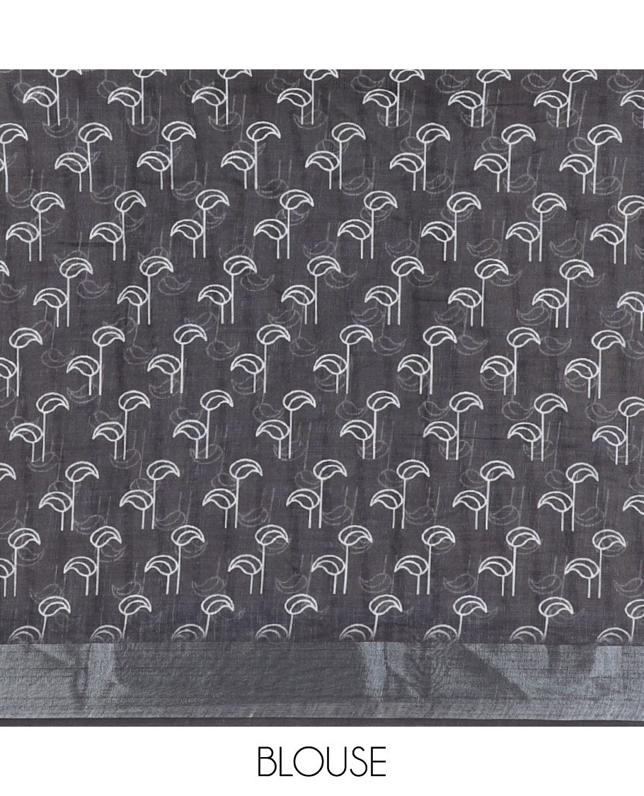 White and black combo printed linen cotton saree features stripes and leaf creeper design, zari border, geometric printed pallu, and contrast printed blouse