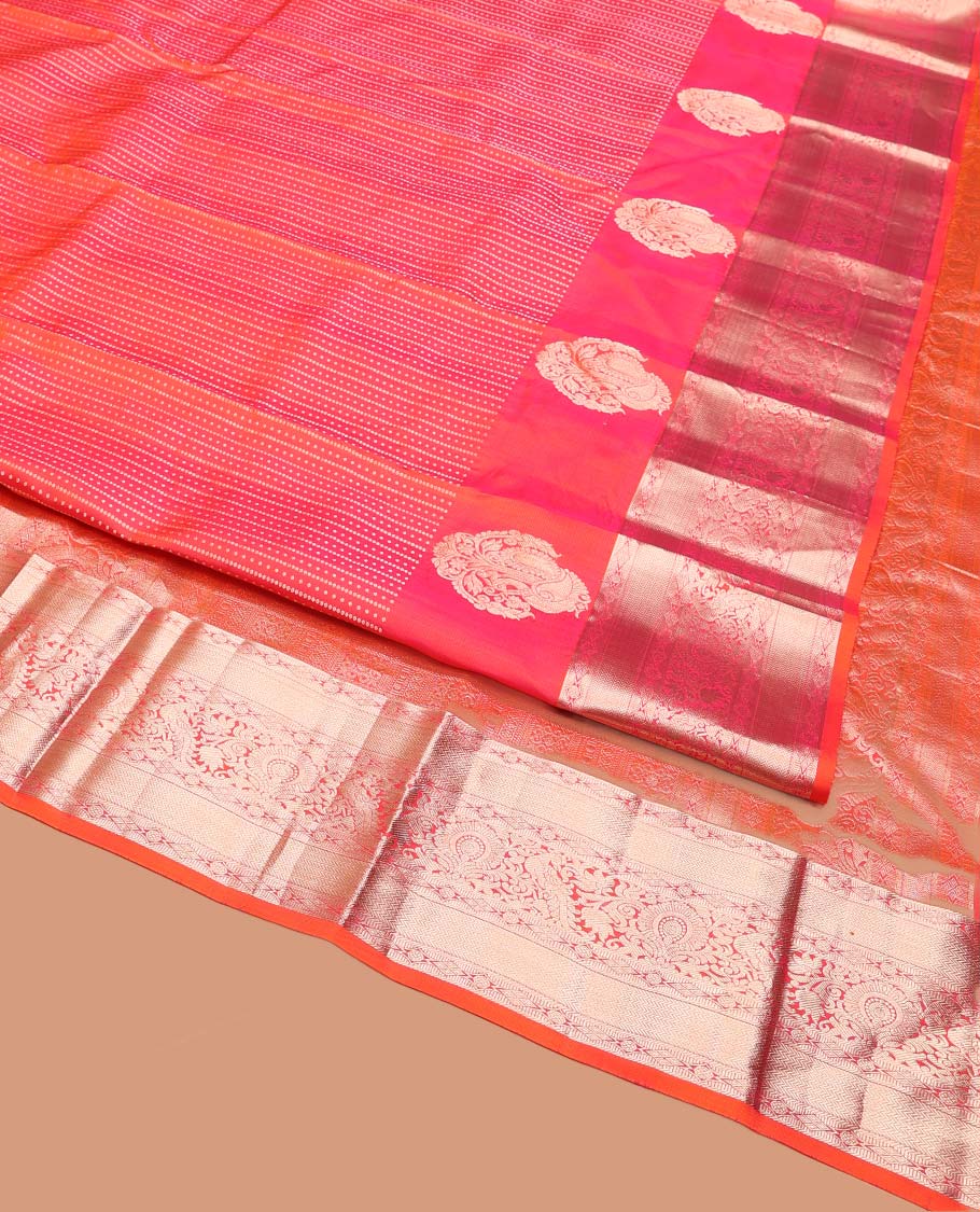 Rose and Orange Vasundhara Silk Saree, Majestically Detailed with Zari Buttas on Its Body, Highlighted by a Zari Border of Mayil, Diamond, and Vanki Designs, Richly Zari Detailed Pallu, and Paired with a Matching Blouse