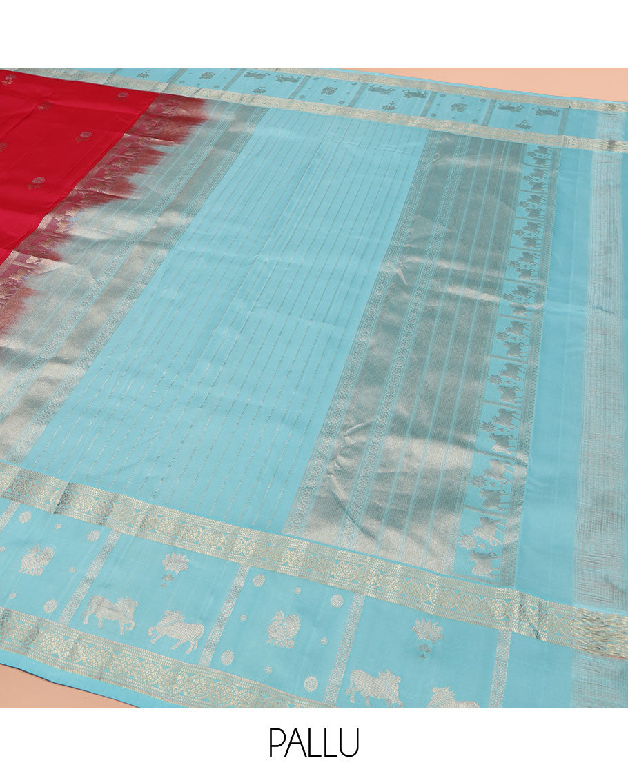 Red Vasundhara Silk Saree, Embellished with Floral Buttas on Its Body, Complemented by Contrast Border of Kodi Visiry, Annam, Pichwai Cow and Lotus Designs, Meticulously Crafted Pallu, and Paired with a Contrast Blouse