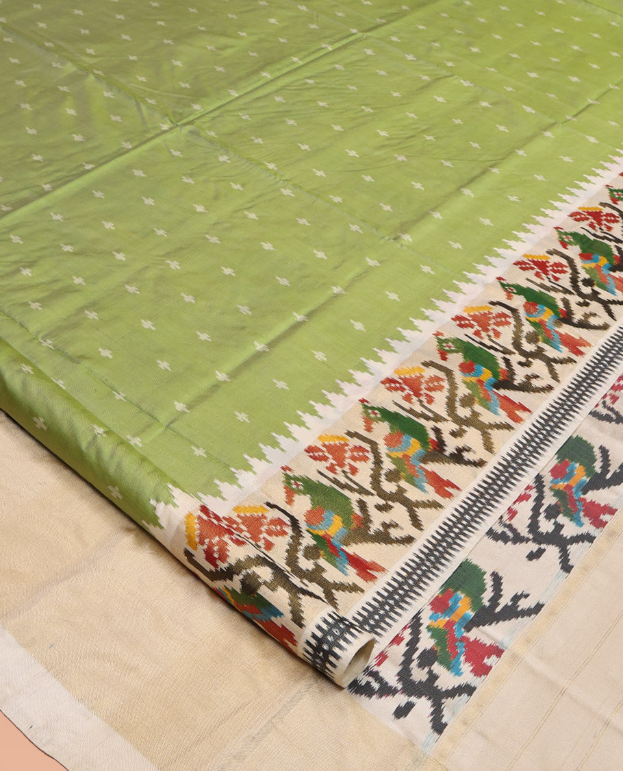 Green Pochampally Ikat Silk Saree, Steeped with Ikkat Buttas on Its Body, Complemented by a Contrast Temple Border of Paithani-Style Floral-Peacock Designs, Pallu of Same Design, and Paired with a Contrast Blouse