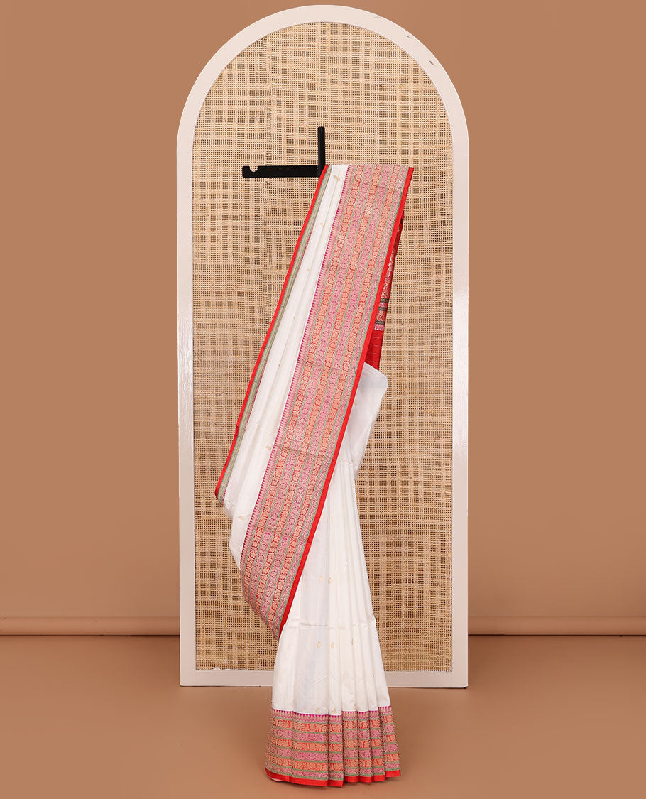 Cream zari buttas katan silk saree, contrast floral creeper design steeped border, and floral design weave pallu