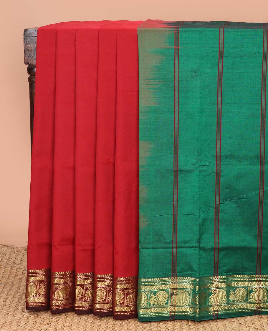 Red plain poly cotton saree, contrast traditional zari border, and contrast striped pallu