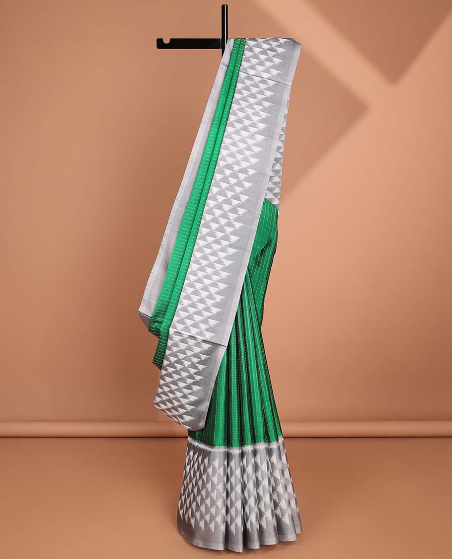 Green checked soft silk saree with contrast border & ara maadam design pallu