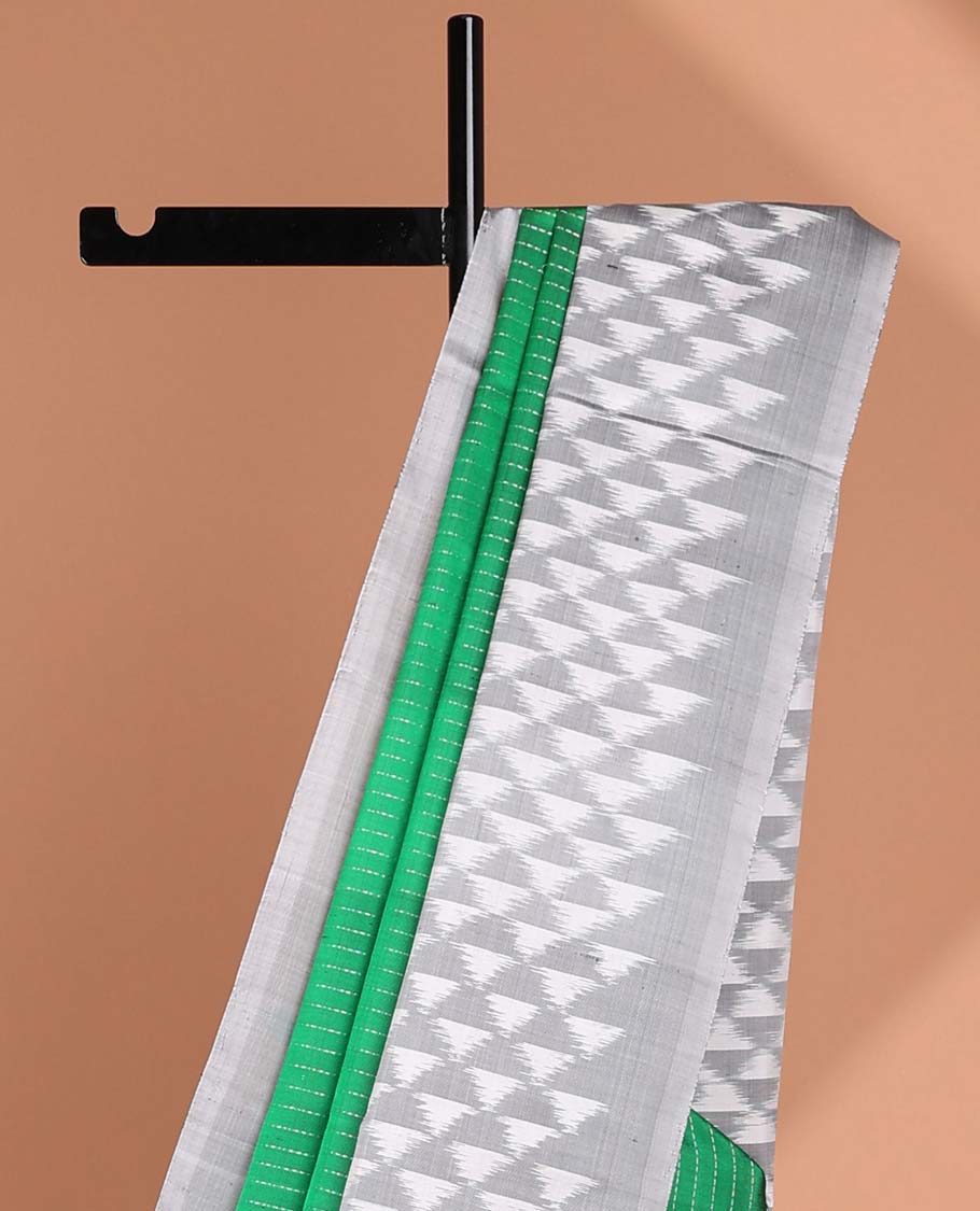 Green checked soft silk saree with contrast border & ara maadam design pallu