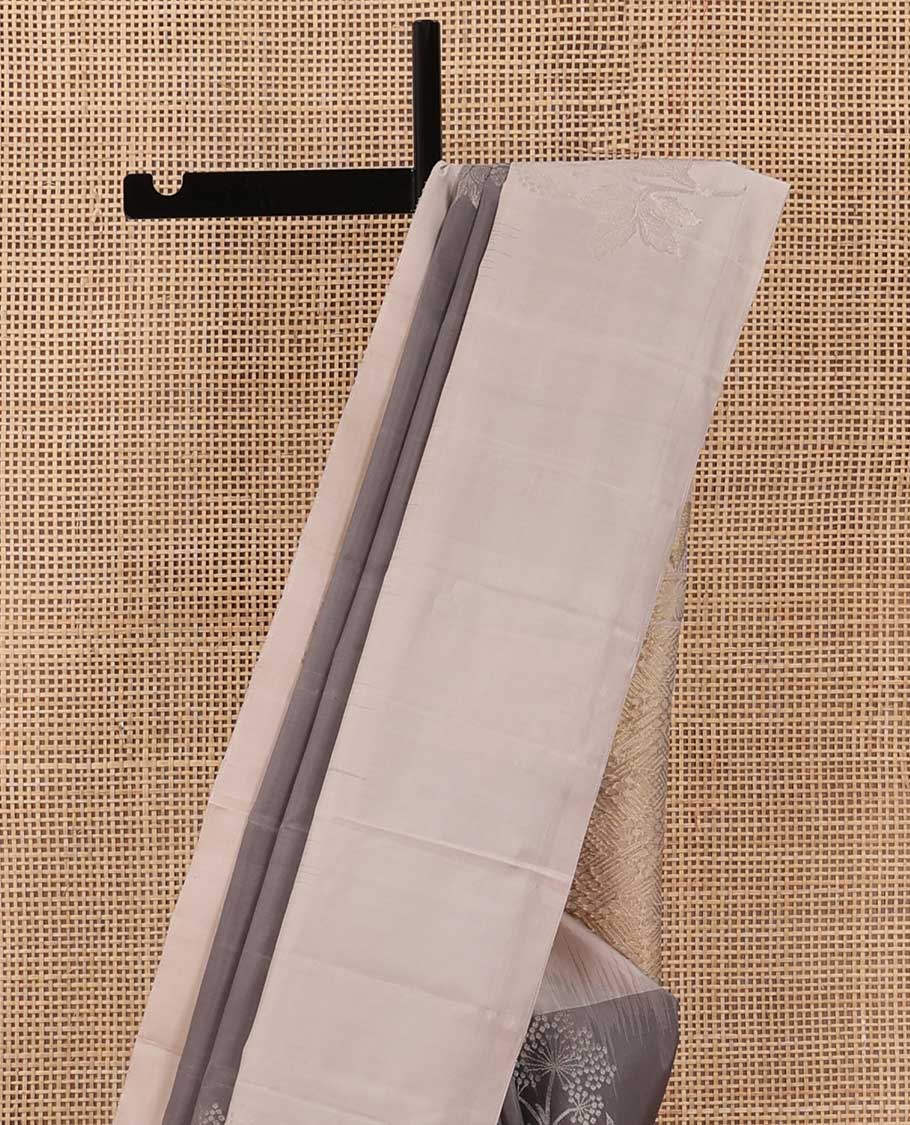 Grey floral buttas soft silk saree, contrast border of floral buttas, and jaal pallu