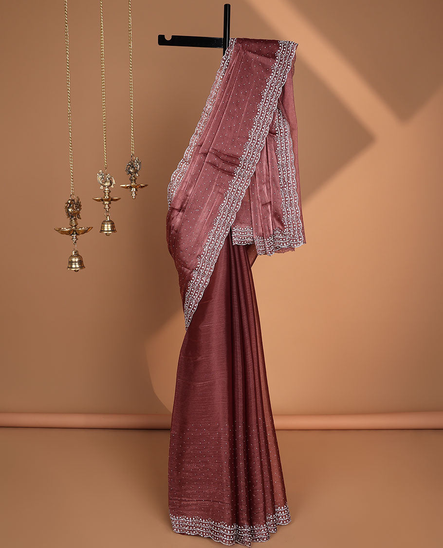 Pink all-over stone work burburry chiffion saree with self cutthana stone work border