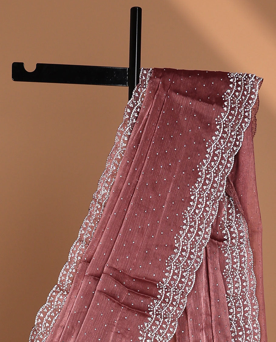 Pink all-over stone work burburry chiffion saree with self cutthana stone work border
