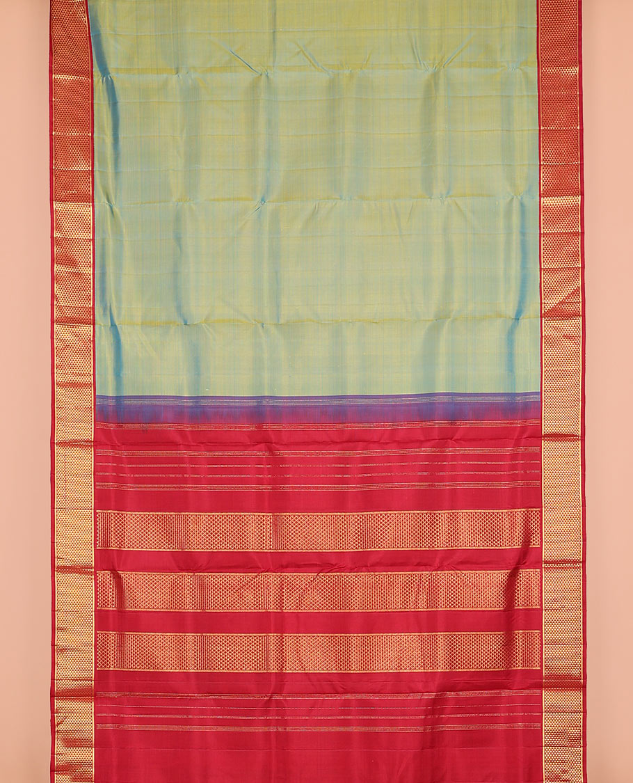 Blue dual-toned plain nine-yard silk saree, contrast ara maadam design korvai border, and pallu of ara maadam designs