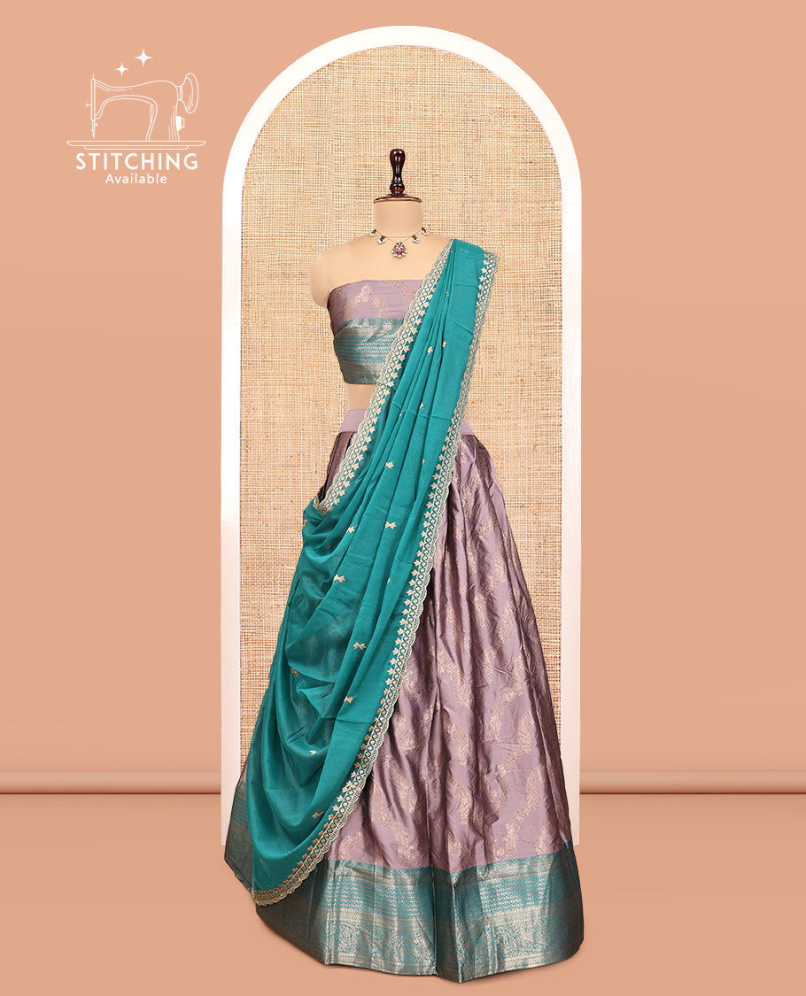 Grey Banarasi Half-Saree, Subtly Sparkled with Jacquard Design, a Contrast Traditional Zari Border, a Matching Blouse, and a Contrast Embroidered Dhavani