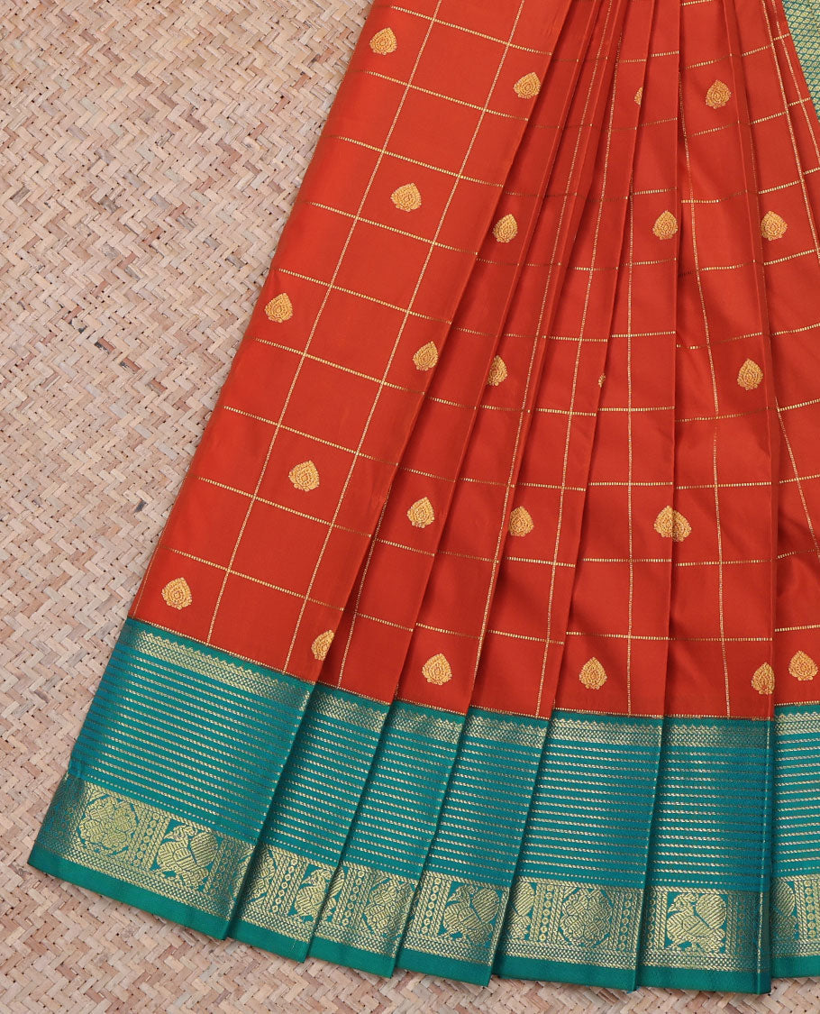 Orange Budget Silk Saree, Beautifully Bedecked with Butta Enclosed Checked All Over Its Body, Complemented by Contrast Traditional Zari Design Border, Sparsely Woven Jaal Pallu, and Paired with a Contrast Blouse