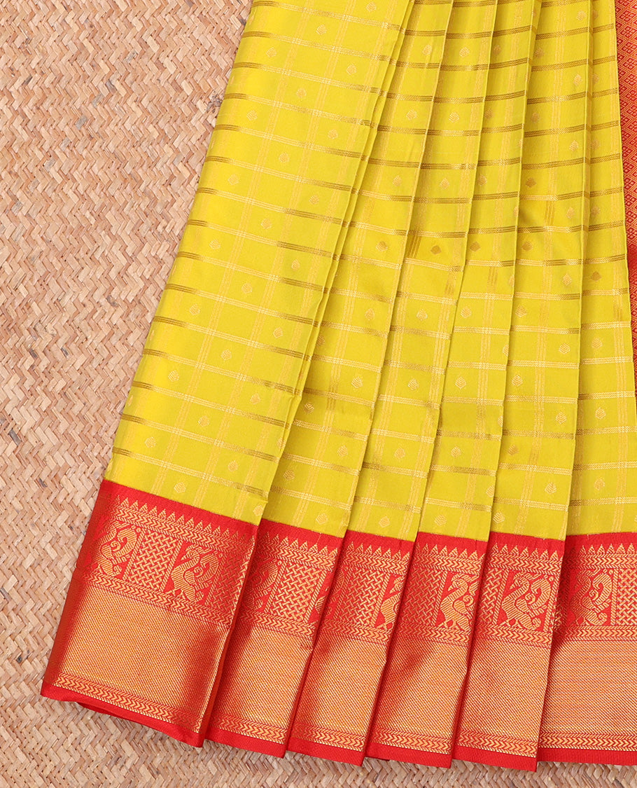 Yellow Budget Silk Saree, Subtly Sparkled With Zari Buttas and Stripes All Over Its Body, Complemented by Contrast Traditional Zari Designs Woven Border, Grand Jaal Pallu and Paired with a Contrast Blouse