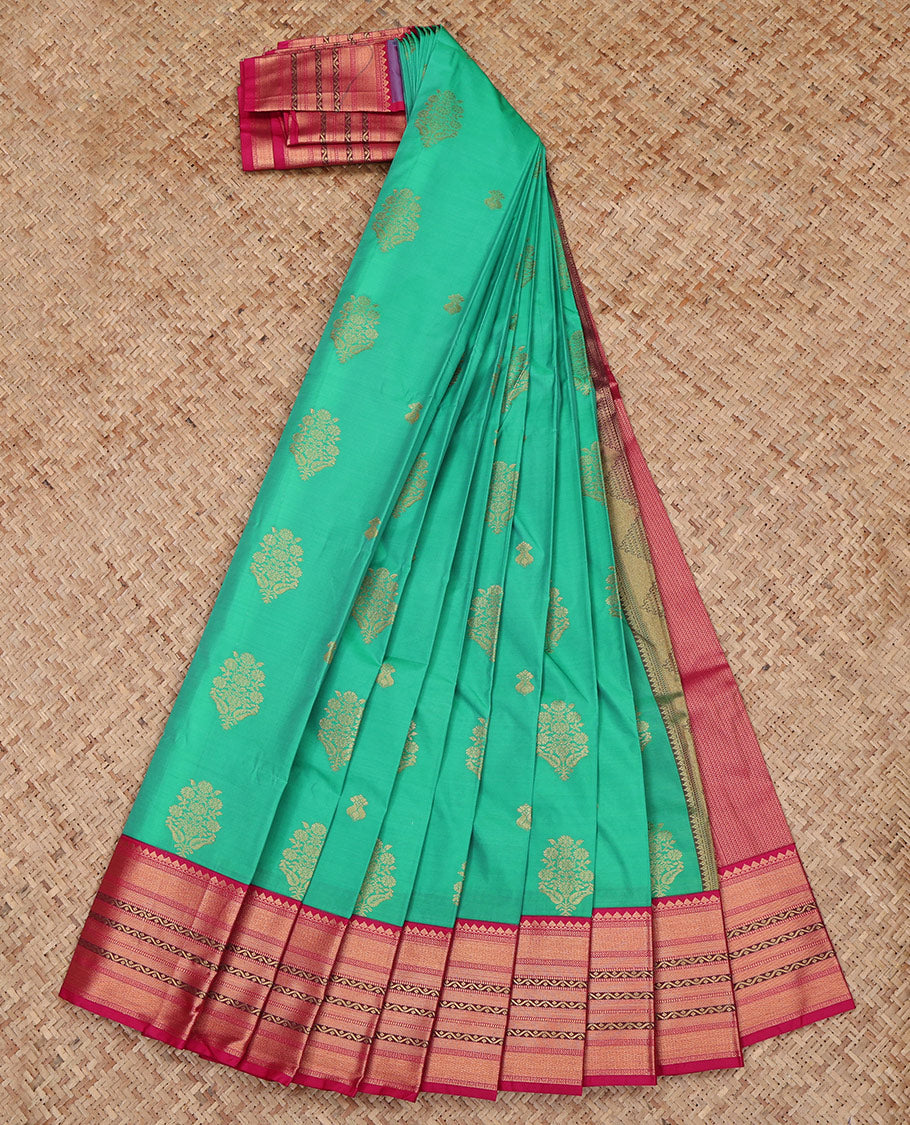 Green Budget Silk Saree, Elevated with Zari Buttas All Over Its Body, Complemented by a Contrast Traditional Zari Design Border, Grand Pallu, and Paired with a Contrast Blouse