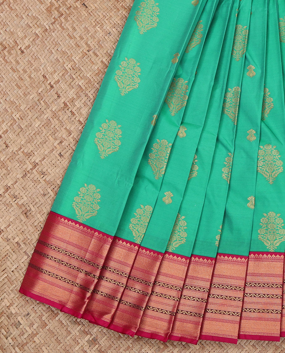Green Budget Silk Saree, Elevated with Zari Buttas All Over Its Body, Complemented by a Contrast Traditional Zari Design Border, Grand Pallu, and Paired with a Contrast Blouse
