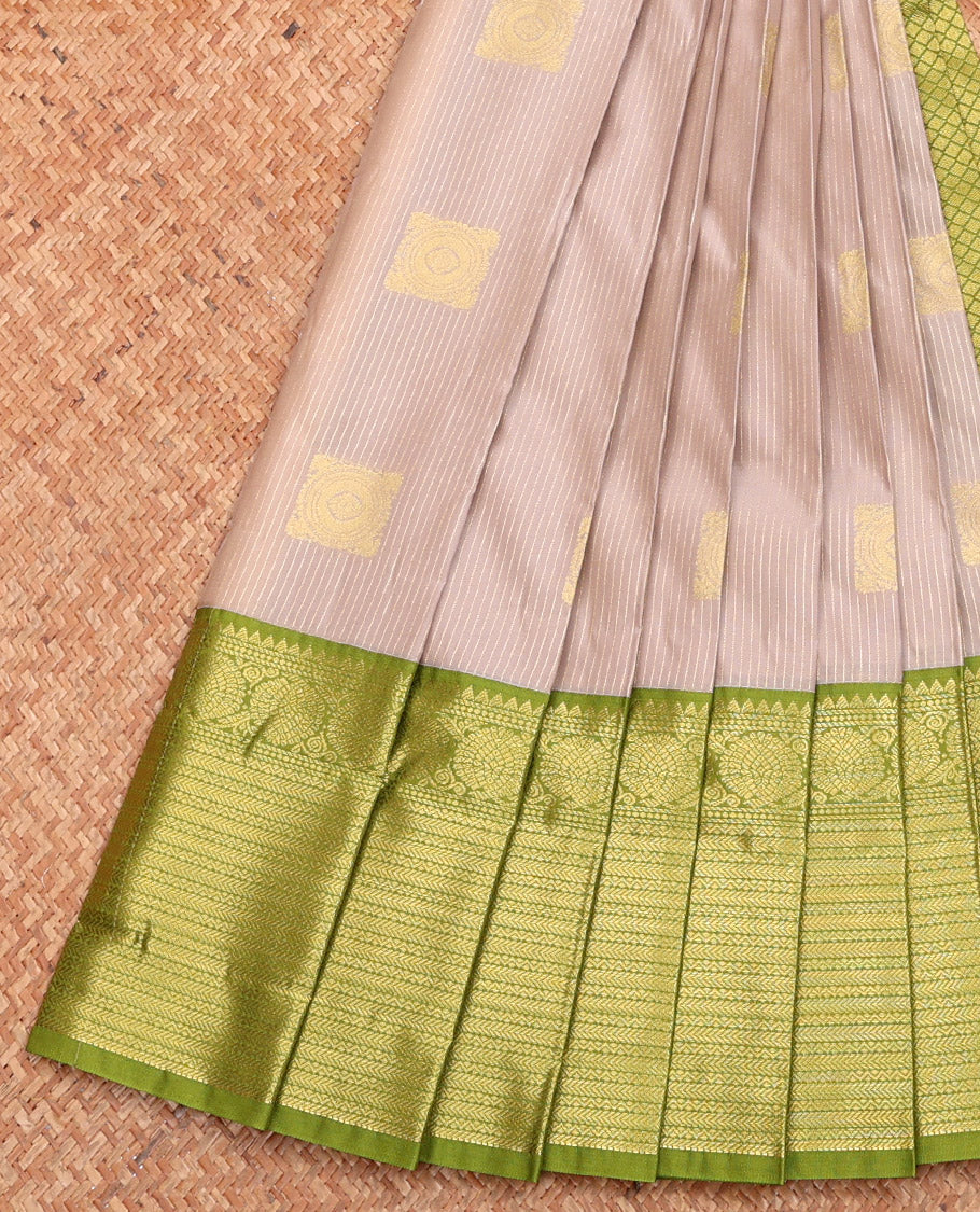 Grey Budget Silk Saree, Sparsely Threaded with Zari Buttas and Stripes, Complemented by a Contrast Traditional Zari Border, Jaal Pallu, and Contrast Blouse