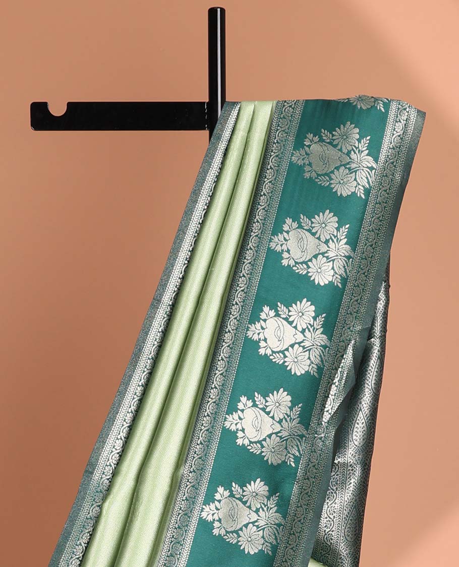 Mint green floral motifs litchi silk saree with contrast floral design border & floral jaal design pallu