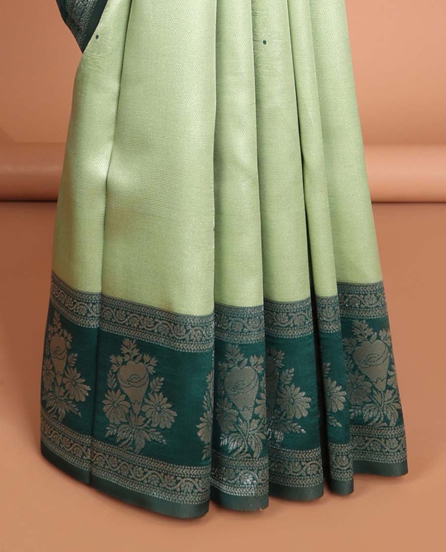 Mint green floral motifs litchi silk saree with contrast floral design border & floral jaal design pallu
