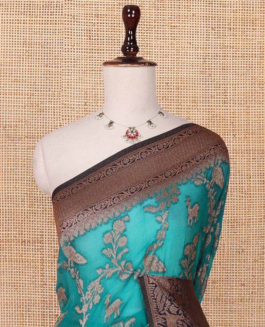 Blue floral jaal jacquard fancy crepe saree, contrast traditional zari border & flora-fauna motifs steeped pallu