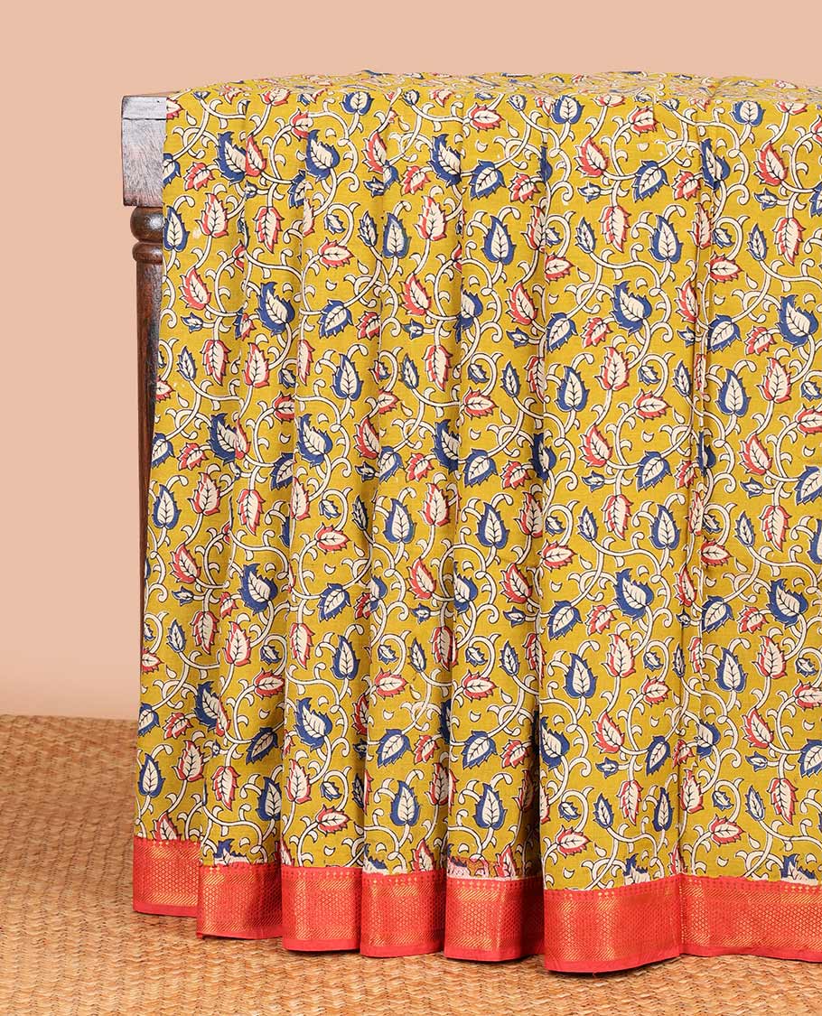 Mustard floral vine design machine-printed kalamkari cotton saree with contrast border of zari design & animal motif pallu