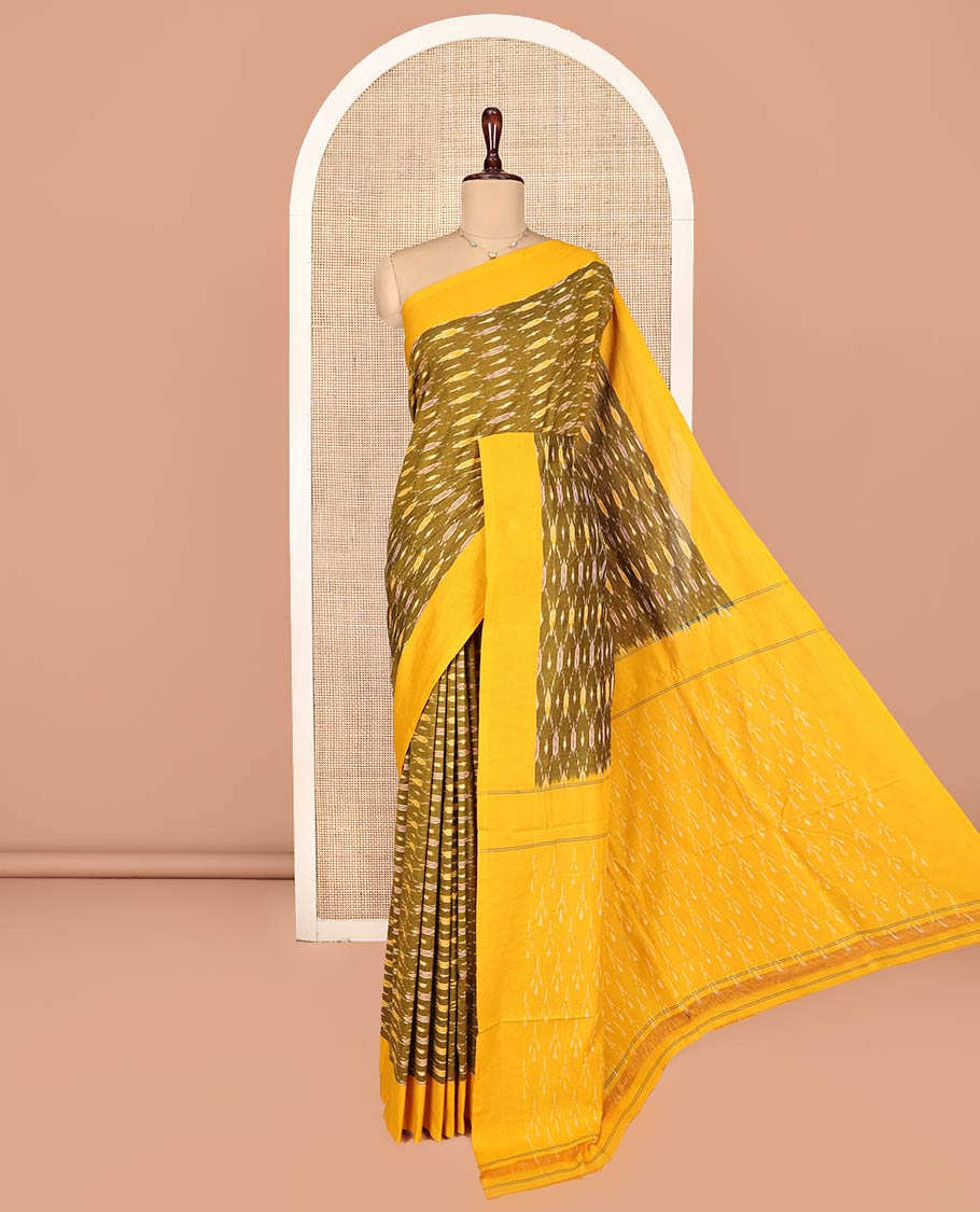 Green Ikkat Cotton Saree, Adorned with Ikkat-Style Ogee Patterns on Its Body, Complemented by Contrast Plain Border, Pallu of Ikkat Designs, and Has No Blouse