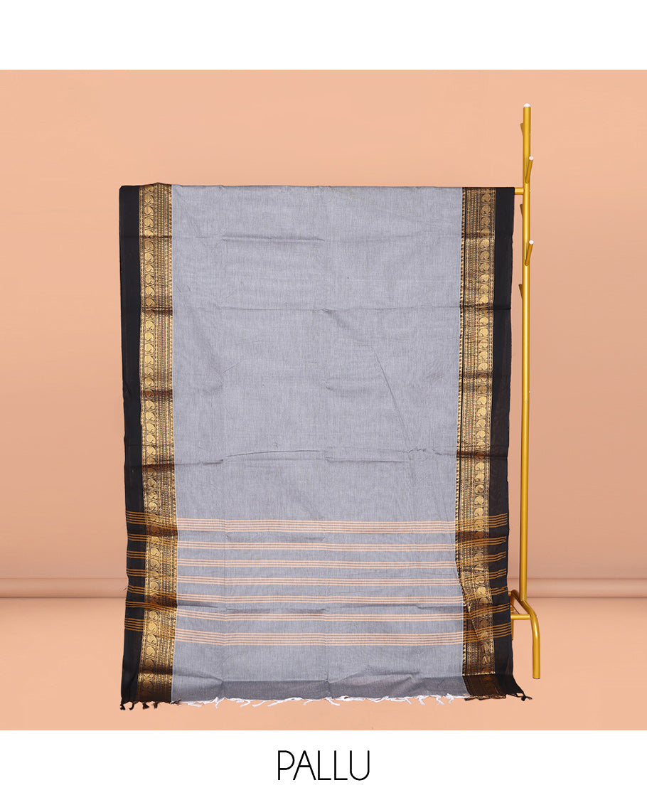 Grey Plain Chettinad Cotton Saree, Complemented by a Contrast Traditional Zari Design Woven Kal Eragina Border, Pallu of Stripes, and Paired with a Matching Blouse