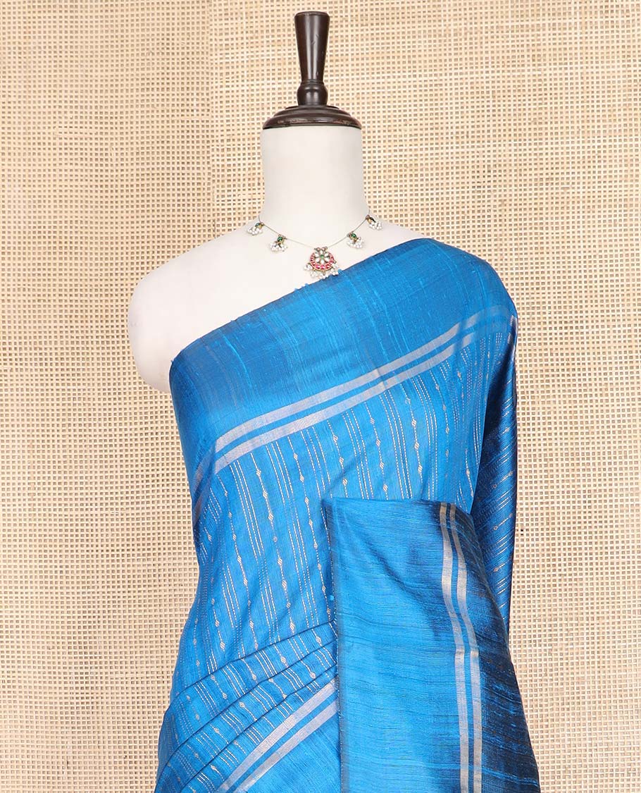 Blue Dupion Silk Saree, Beautified with Stripes All Over Its Body, Zari-Striped Border, Pallu Steeped with Dobby-Style Buttas, and Paired with a Matching Blouse