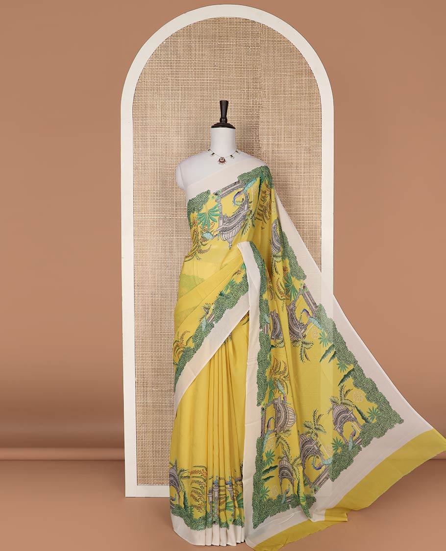 Yellow georgette saree with contrast forest theme design border