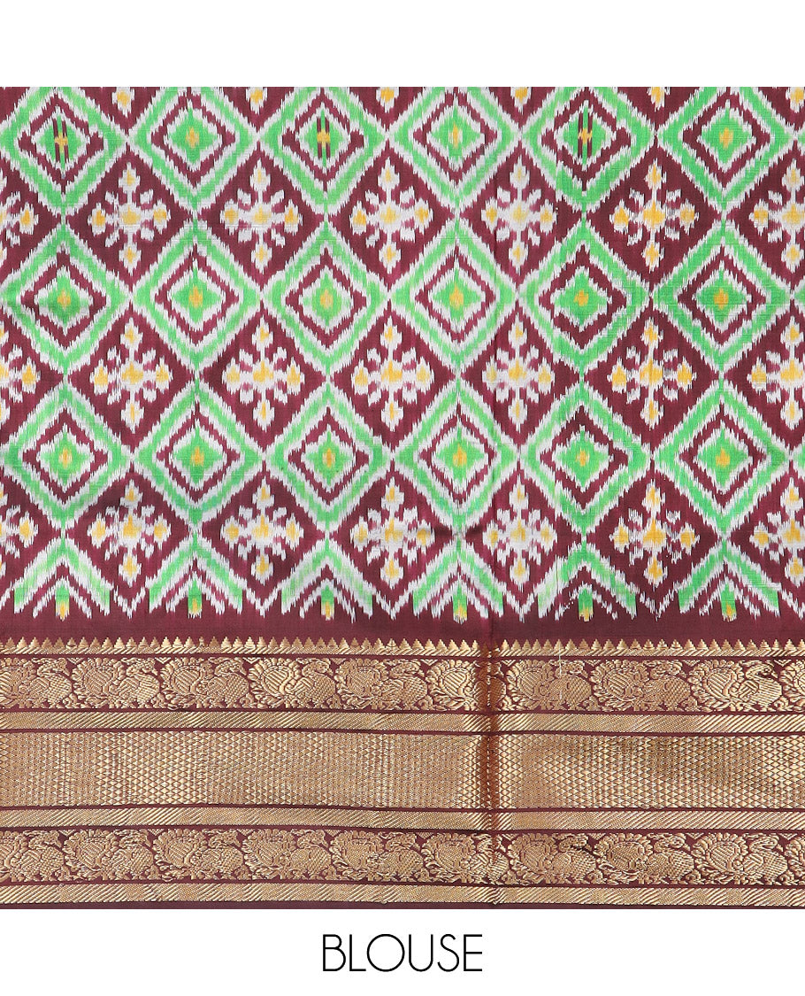 Mustard Plain Ikkat Silk Saree, Complemented by a Contrast Temple Traditional Zari Motif Woven Border, Pallu Adorned with Vibrant Jaal Design, and Paired with a Multi-Coloured Blouse