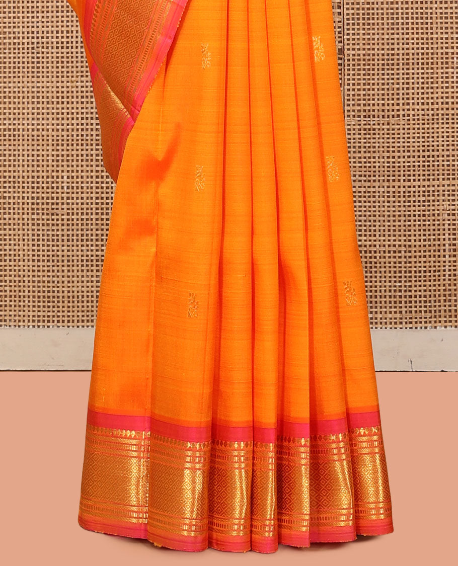 Orange Kanchipuram Silk Saree, Woven with Zari Buttas, a Contrast One-Sided Border of Banaras, Muthu, and Mayil Kann Designs, a Zari Design Pallu, and No Blouse