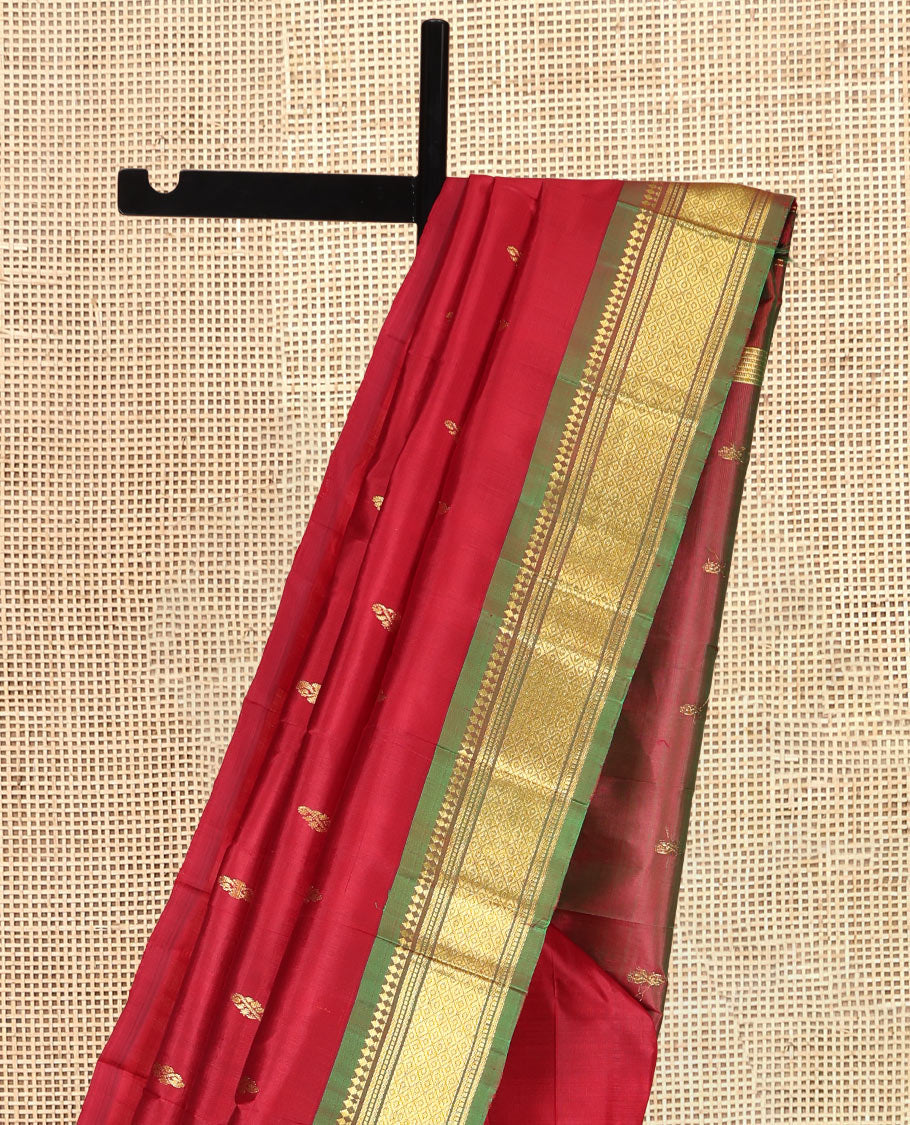 Maroon Zari Buttas Kanchipuram Silk Saree, Complemented by a Contrast One-Sided Border of Panner Sombu, Banaras, Muthu, and Jaal Designs, Zari Design Pallu, and a No Blouse