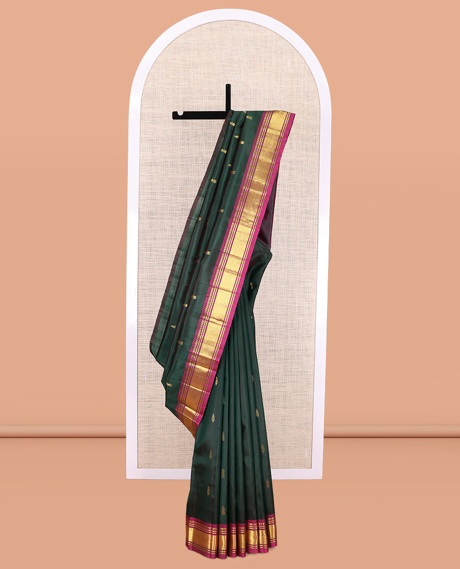 Green Kanchipuram Silk Saree, Woven with Zari Buttas, a Contrast One-sided Border of Panner Sombu, Banaras, and Mayil Kann Designs, Pallu of Zari Designs, and No Blouse