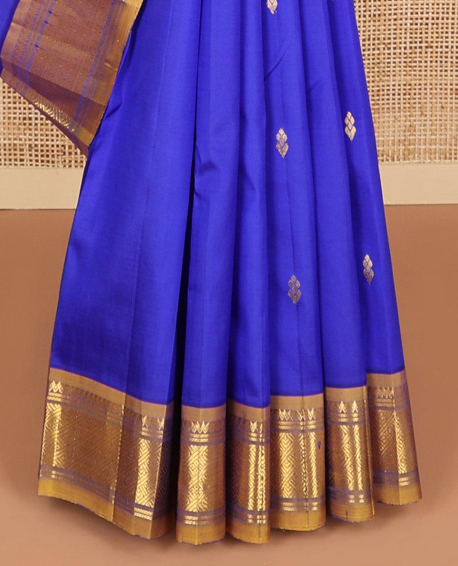 Ink blue buttas kancheepuram silk saree with contrast korvai intricate zari design border & floral design pallu