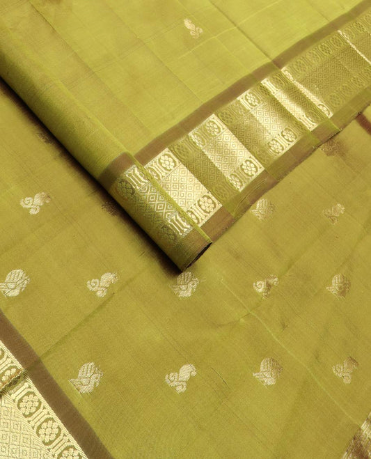 Green zari buttas kanchipuram silk saree, contrast one-sided border of mayil kann & laddu kamalam designs & zari woven pallu