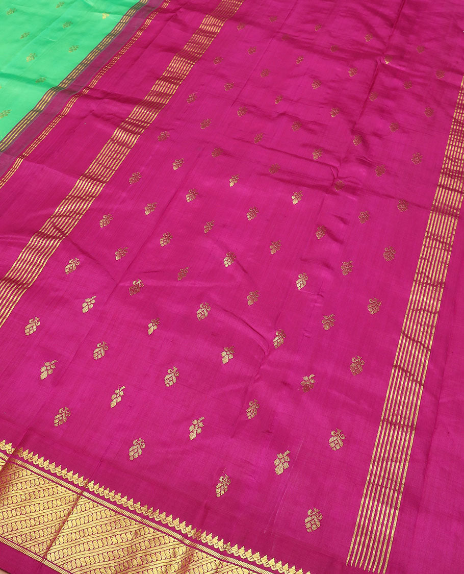 Green zari buttas Kanchipuram silk saree, contrast korvai border of thilakam mokku, banaras, and puli nagam designs, and zari design pallu