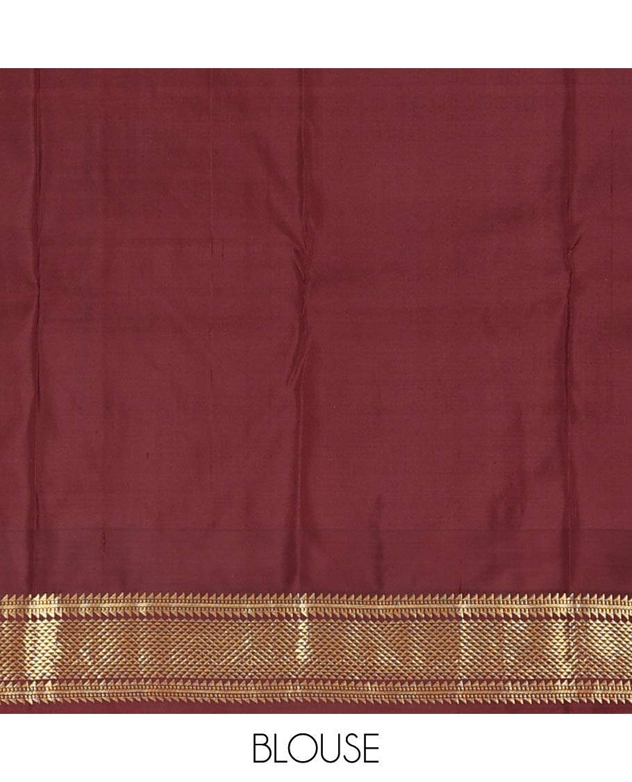 Orange zari buttas silk saree, contrast border of thazampoo rekku,ara bogudi,muthu & ara maadam & circular motifs pallu