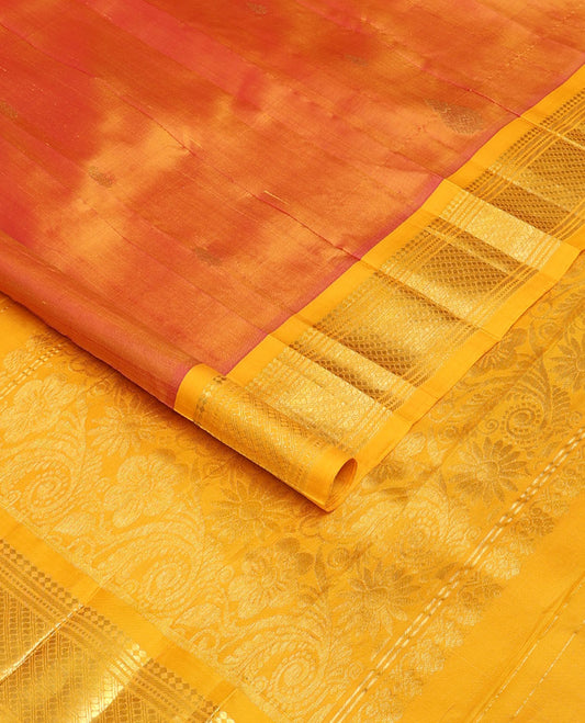 Orange zari buttas Kanchipuram silk saree, contrast one-sided border of panner sombu,banaras,muthu & godhumai kann & floral design pallu