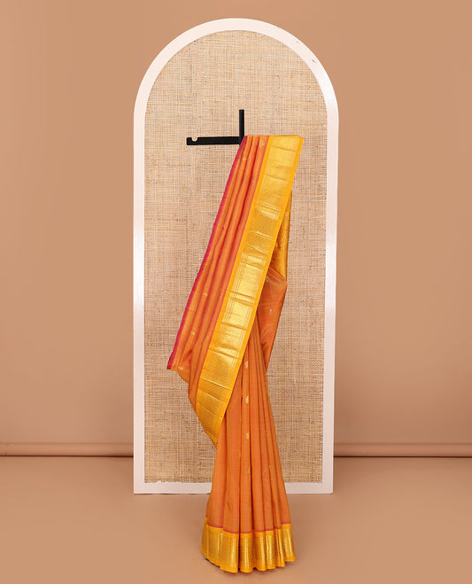Orange zari buttas Kanchipuram silk saree, contrast one-sided border of panner sombu,banaras,muthu & godhumai kann & floral design pallu