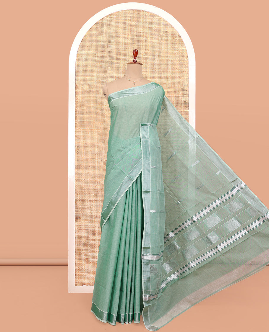Green Kerala Cotton Saree, Woven with Buttas All Over Its Body, a Zari Bavanji Border, Pallu of Intricate Designs, and Paired with a Matching Blouse